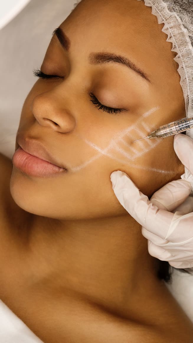 Woman receiving botox treatment